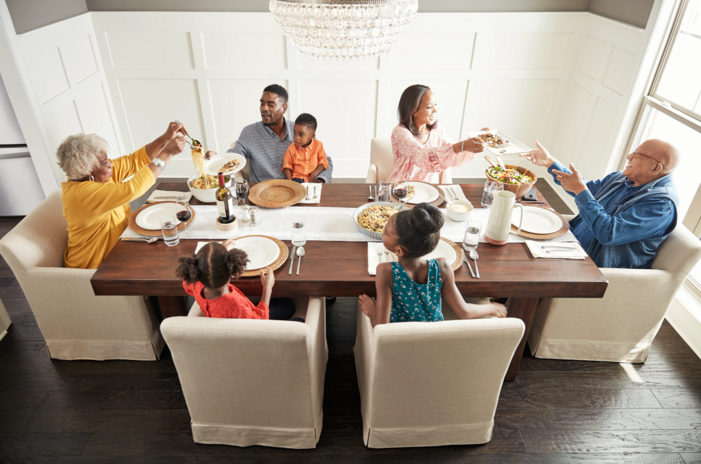 Family having breakfast at the dining table | Gregory's Tile & Carpet